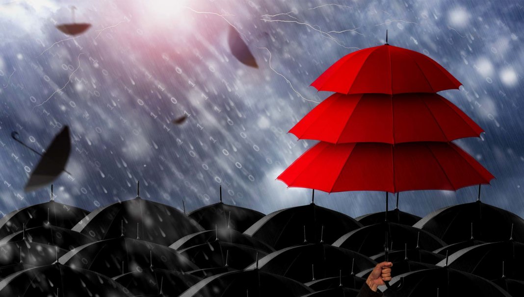 insurance agent holding three layer red umbrella
