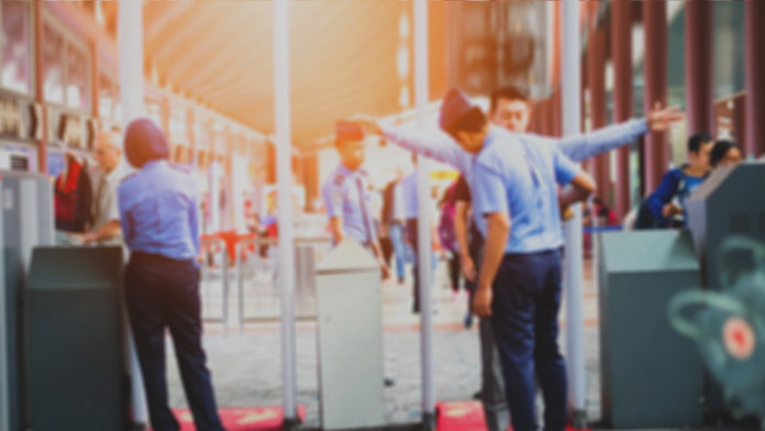 blurred airport security check gates
