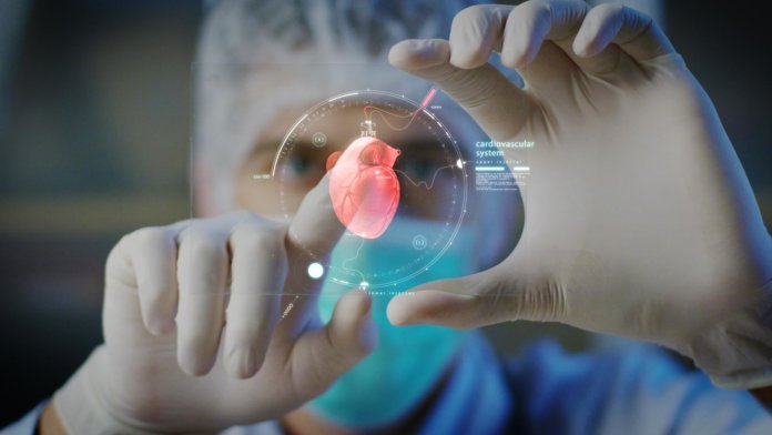 physical surgeon examines technological digital holographic display