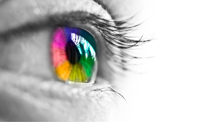 human eye with rainbow iris