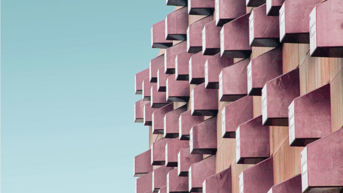 pink boxes architecture building blue sky background Curation