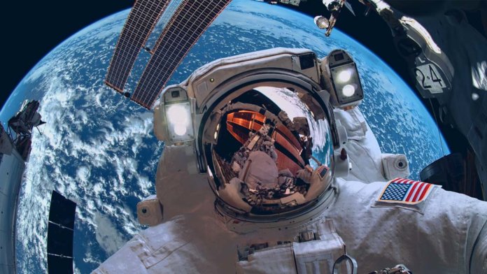 International Space Station and astronaut in outer space