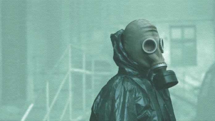 scientist with protective mask and clothing chernobyl radiation environment