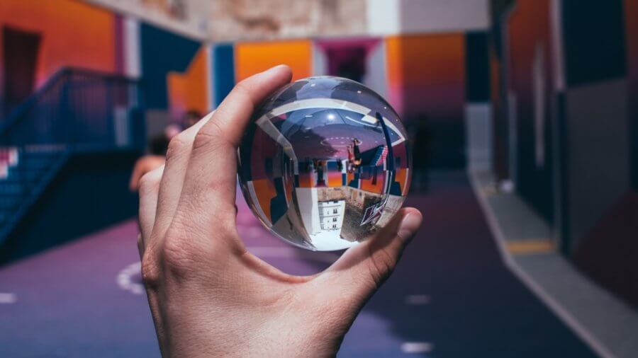 future hand holding crystal ball