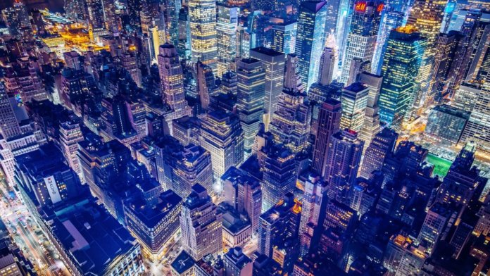 tech curation new york city skyline night colorful lights