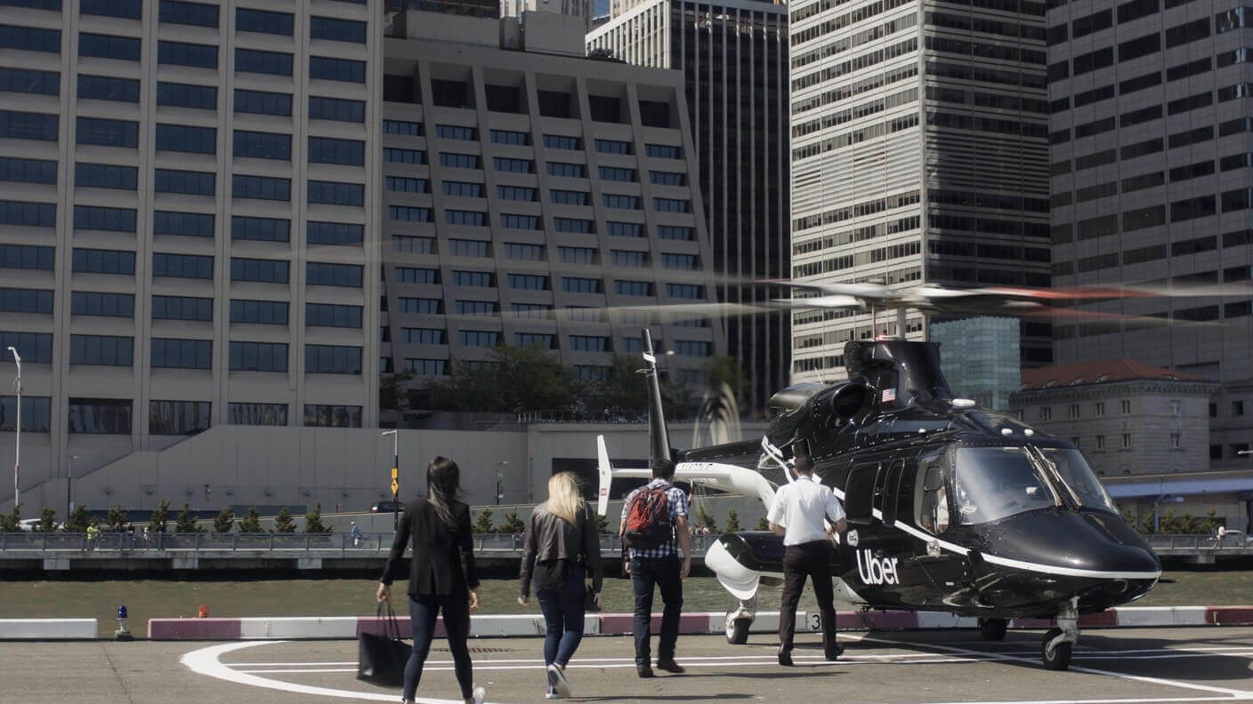 flying taxi helicopter passengers helipad uber copter