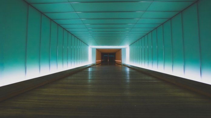 tech stories green white hallway vanishing point