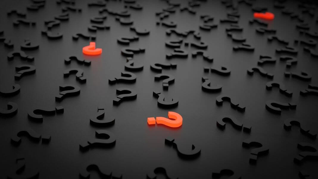 AI ethics black background with question marks