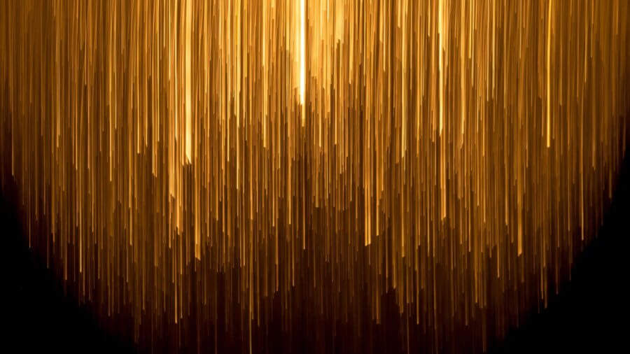 tech stories glowing golden lines light on dark background