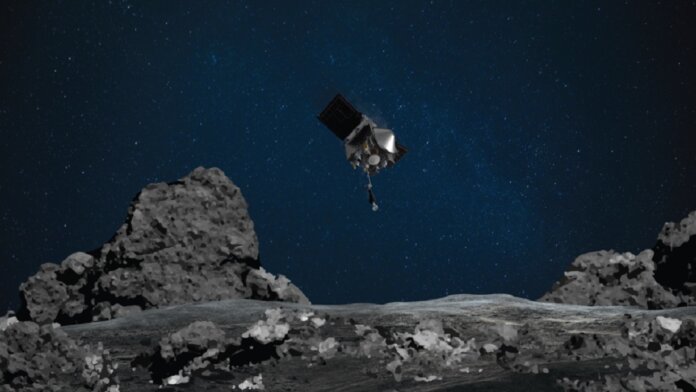 OSIRIS-REx spacecraft near asteroid in space NASA