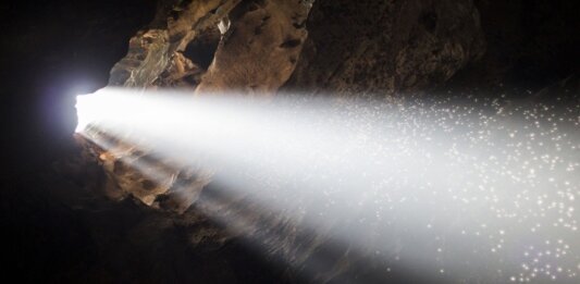 beam of light in cave optogenetics brain