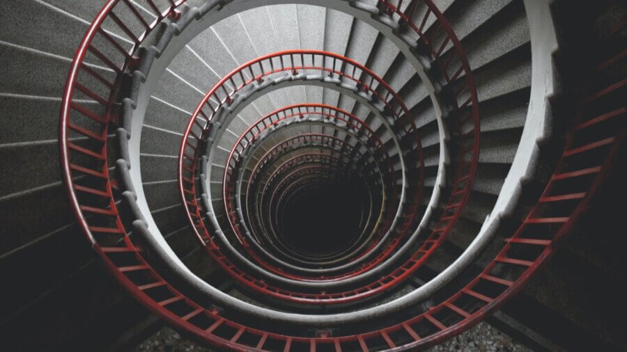 tech stories spiral stairs red bannister