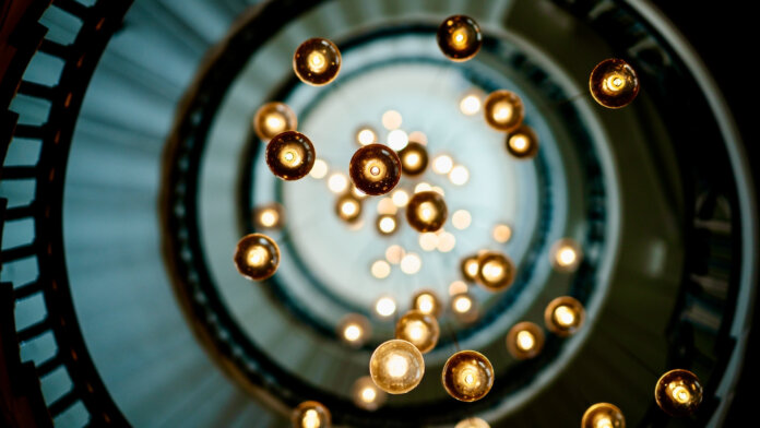 tech stories circle swarm light bulbs