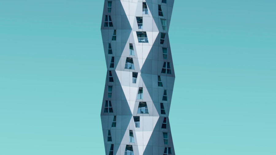 tech stories geometric architecture building blue green sky
