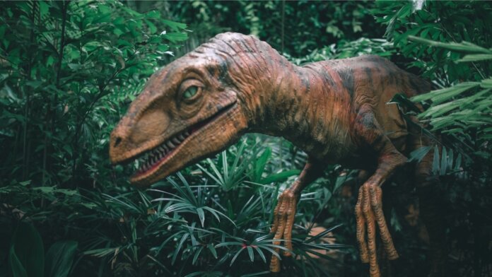 jurassic park genetic engineering ethics velociraptor dinosaur green leaves jungle