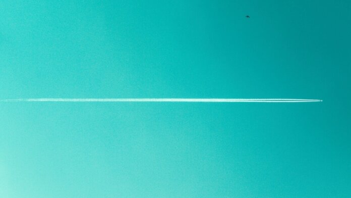 tech stories jet high altitude gradient green sky