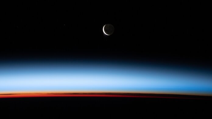 crescent moon view from ISS NASA
