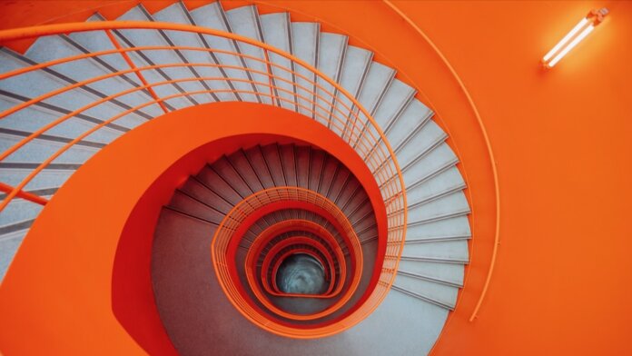 tech stories orange grey spiral stairs