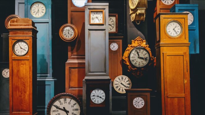perception of time grandfather clocks side by side