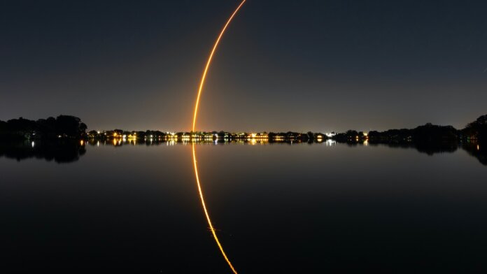 awesome tech stories spacex falcon 9 rocket launch reflection water