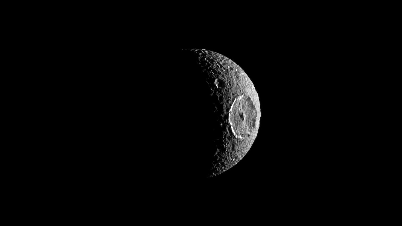 Scientists 'Astonished' Yet Another of Saturn's Moons May Be an